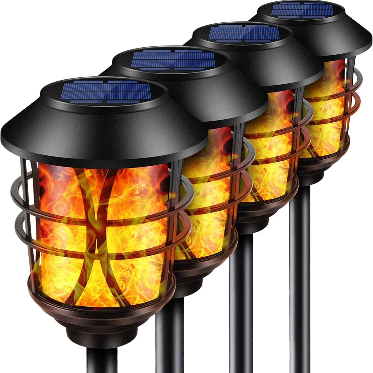 Four TomCare metal solar flame torch lights with wide black caps, caged bodies and a bright orange flame effect on tall ground stakes